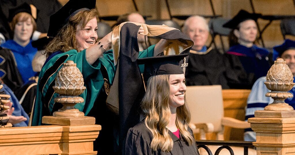 Wake Forest School of Business holds hooding ceremony for graduate